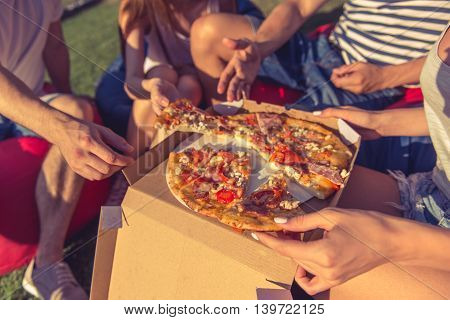 Young People Resting Outdoors