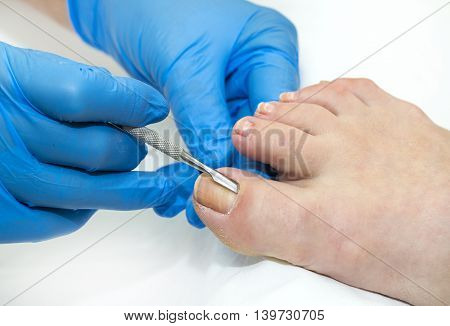 process of pedicure women at beauty salon
