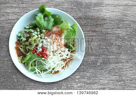 Local Thai foods of Rice Vermicelli is name KHANOM CHINspicy noodles with vegetable and hot soup.