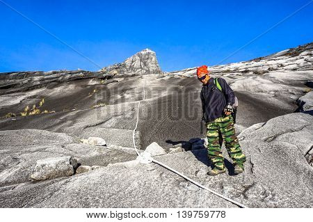 Ranau,Sabah,Malaysia-March 13,2016:Undentified climbers move down to Laban Rata after succesfully completed conquering the mountain Kinabalu.