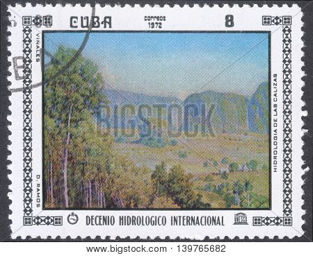 MOSCOW RUSSIA - CIRCA FEBRUARY 2016: a post stamp printed in CUBA shows painting by D. Ramoz the series 