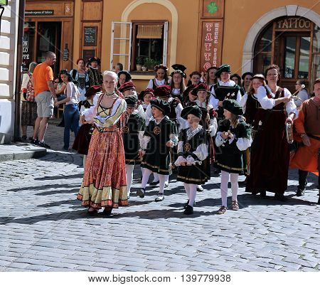 CESKY KRUMLOV, CZECH REPUBLIC - JUNE 18, 2016: Five-petalled Rose Festival on bystreet in Cesky