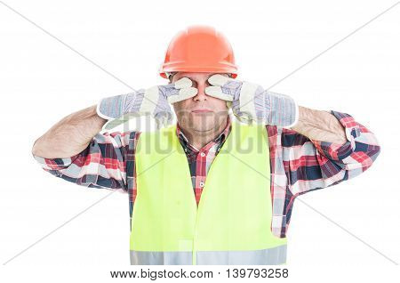 Male Builder Making The See No Evil Gesture