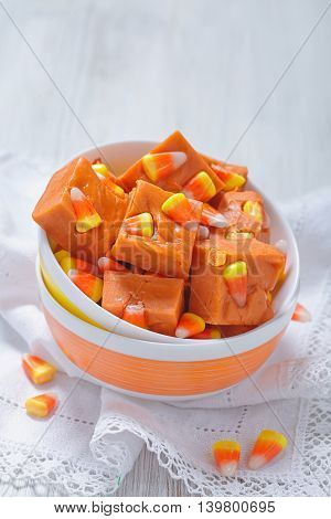 Delicious butterfinger fudge with candy corn and peanut butter