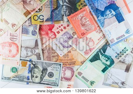 Multiple currency banknotes as colorful background showed the global money financial business economy crisis due to British out of European Union