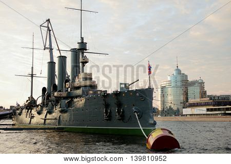 ST. PETERSBURG, RUSSIA - JULY 19, 2016: Russian cruiser Aurora moored at the embankment of Nevka river. The ship has been overhauled and returned from the shipyard on July 16