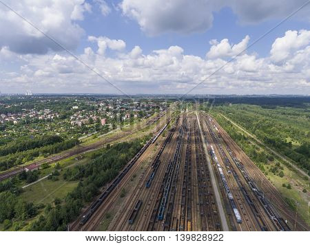 Depot With Many Railways At Day In City At Sunny Day. View From Above.