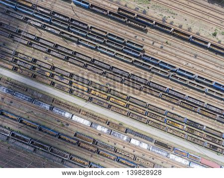 Depot With Many Railways At Day In City At Sunny Day. View From Above.