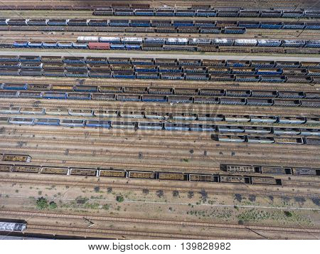 Depot With Many Railways At Day In City At Sunny Day. View From Above.