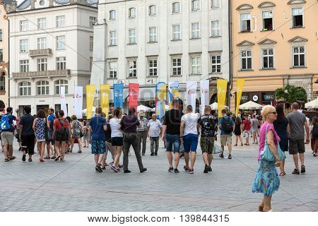 CRACOW POLAND - JULY 24 2016: Flags of World Youth Day 2016 on Main Square in Cracow. Poland