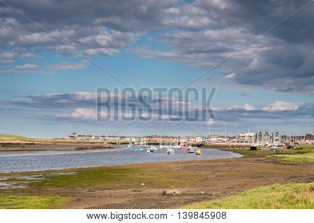 River Coquet flows passed Amble Harbour, where it meets the sea