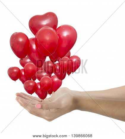 Woman hands giving a group red balloons