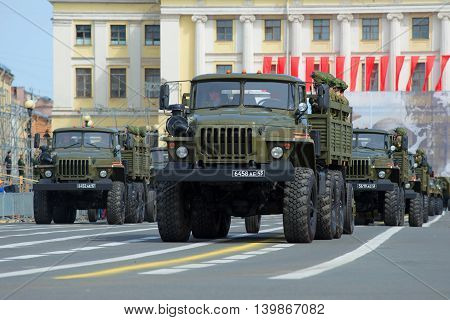 SAINT PETERSBURG, RUSSIA - MAY 05, 2015: Cars Ural-4320 with the soldiers at the rehearsal of parade in honor of Victory Day on Palace square