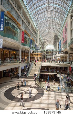 Toronto - 4 July 2016: Shoppers Visit Eaton Center Mall In Toronto.