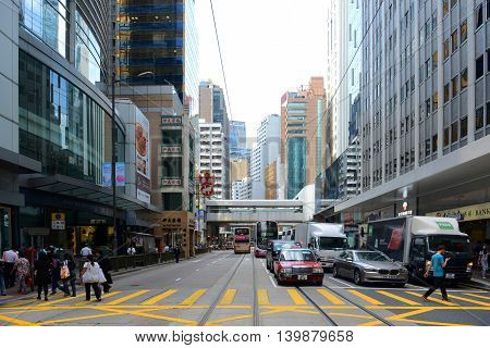 HONG KONG - NOV 9: Hong Kong Des Voeux Road Central at the center of Financial District on Nov 9, 2015 in Hong Kong. Des Voeux Road is a major road on the north shore of Hong Kong Island.