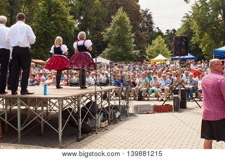 Buchlovice, Czech Republic, July 23, 2016: Celebration of garlic. Traditional farmers harvest celebrations of garlic. Agricultural sales markets. Sales of garlic, performances by folk ensembles.