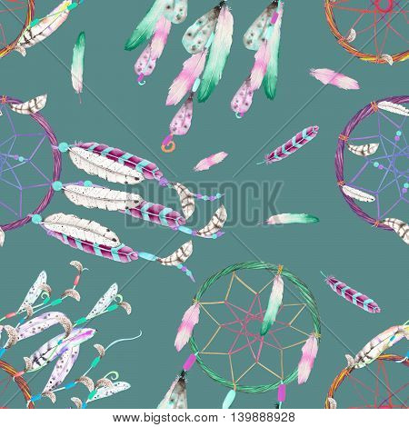 Seamless pattern with dreamcatchers and feathers in the air, hand drawn in watercolor on a dark blue background