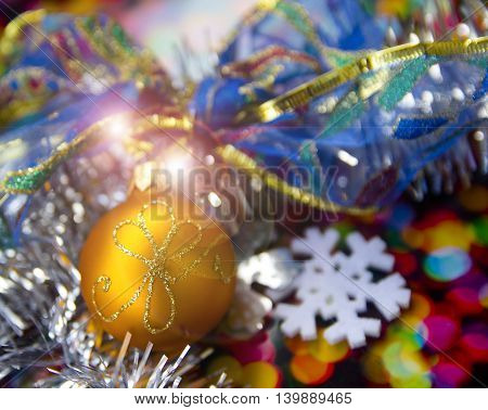 bright Christmas balls with reflections and colored tinsel