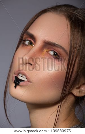 beauty creative makeup with black bread lips