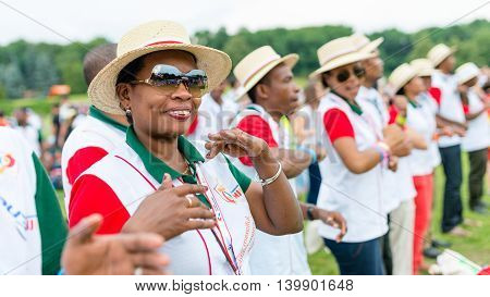 Poznan POLAND - JULY 24 2016: pilgrims praying dancing and singing during Days In Dioceses just before The World Youth Day in Krakow; WYD is a meeting of youth from all over the world