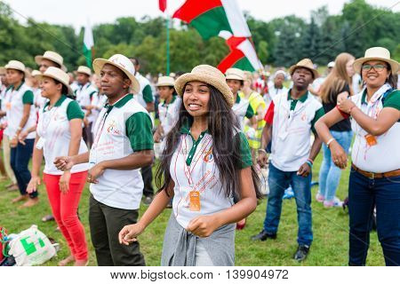 Poznan POLAND - JULY 24 2016: pilgrims praying dancing and singing during Days In Dioceses just before The World Youth Day in Krakow; WYD is a meeting of youth from all over the world