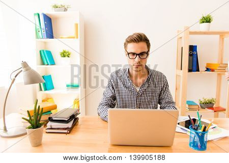 Portrait Of Serious Young Writer Working On New Book