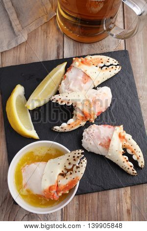 Red king crab fists with lemon, melted butter, and beer