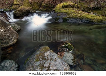 mountain stream of clean water among the stones