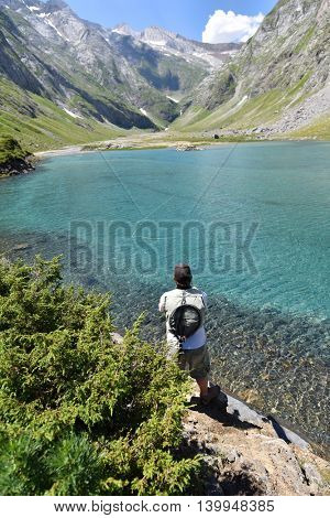 Flyfisherman fishing in mountain lake