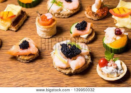 Exquisite selection of luxury canapes appetizer ready to be served for events celebrations or other occasion