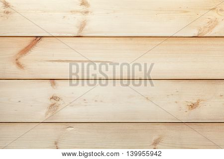 The texture of the old rustic gnarled planks. Wooden light vintage background.