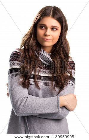 Lady with folded arms. Face of woman shows doubt. Reasons are hard to understand. This isn't a good idea.
