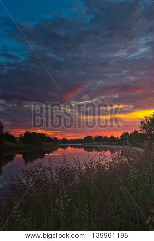 Sunset Clouds Over The River Bend