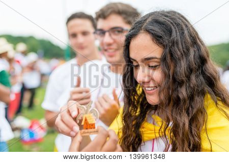 Poznan POLAND - JULY 24 2016: pilgrims spending time together during Days In Dioceses just before The World Youth Day in Krakow; WYD is an international meeting of youth from all over the world
