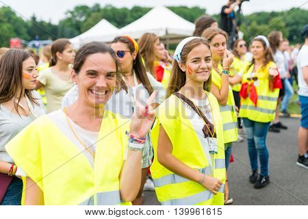 Poznan POLAND - JULY 24 2016: pilgrims spending time together during Days In Dioceses just before The World Youth Day in Krakow; WYD is an international meeting of youth from all over the world