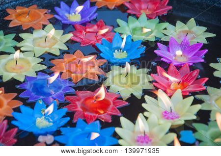 Candle floating. flower candle floating on water.