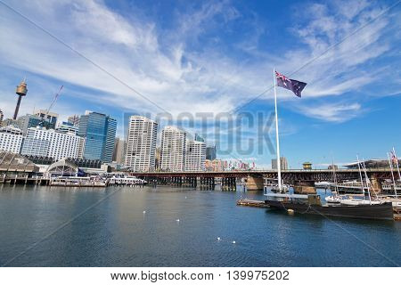 SYDNEY, AUSTRALIA - APRIL, 2016 : Pyrmont Bridge and Cockle Bay in Darling Harbour, Port Jackson in Sydney, Australia on April21, 2016. The bridge only carried pedestrian and bicycle traffic.

