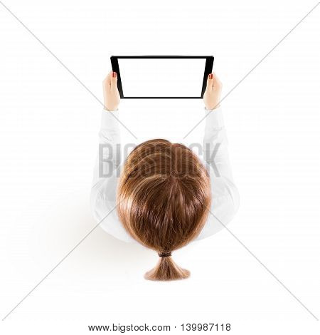 Woman hold tablet pc mockup in hand top view isolated on white. Black mobile ebook mock up holding in female hands from above. Blank tablet screen monitor. Clear horizontal ipad display booklet person
