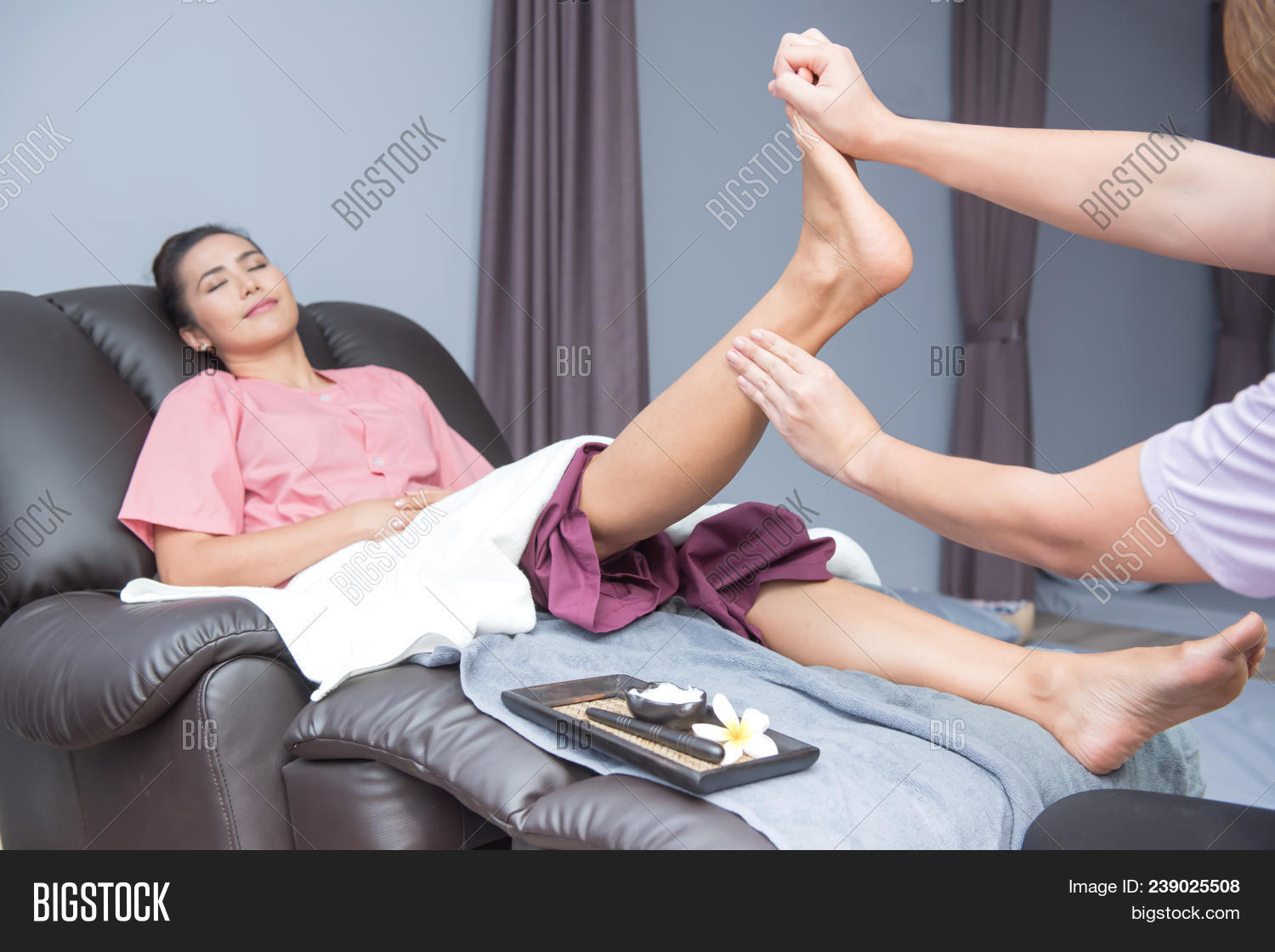 Women feet massaging