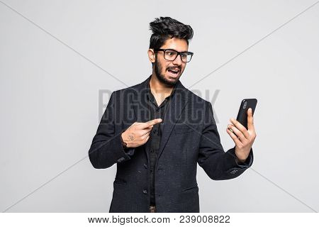 Indian Business Man Points His Finger On Mobile Phone.