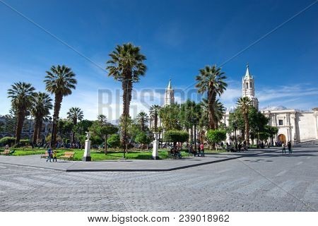 AREQUIPA PERU NOVEMBER 9: Main square of Arequipa with church on november 9 2015 in Arequipa Peru. Arequipa's Plaza de Armas is one of the most beautiful in Peru.