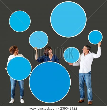 Diverse people holding colorful blank circles