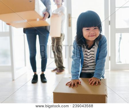 Asian family emoving to new house