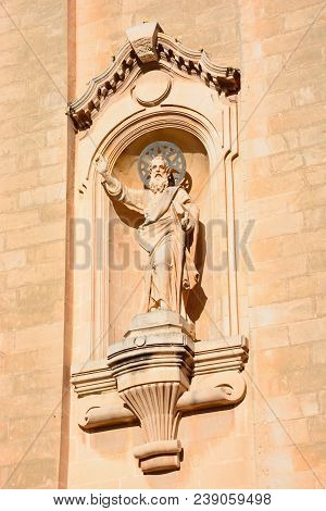 Religious Statue On The Front Of Naxxar Parish Church, Naxxar, Malta, Europe.