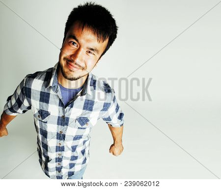 Young Cute Asian Man On White Background Gesturing Emotional, Pointing, Smiling, Lifestyle People Co