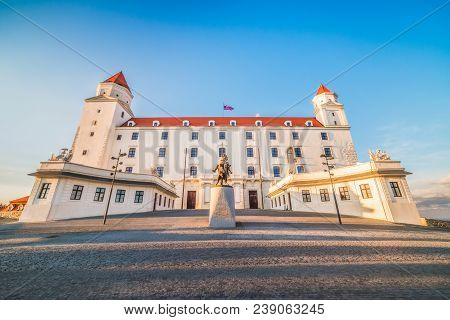 Bratislava Castle Or Bratislavsky Hrad At Sunset. The Main Castle Of Capital City Of Slovakia.