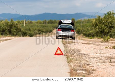 The Car Broke Down On The Road. Emergency Sign Close-up On The Road, Tarragona, Catalunya, Spain