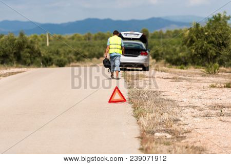 The Car Broke Down On The Road. Emergency Sign Close-up On The Road, Tarragona, Catalunya, Spain