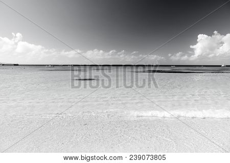 Sea. Beautiful White Clouds On Blue Sky Over Calm Sea With Sunlight Reflection, Bali . Tranquil Sea 