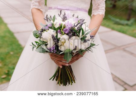 Wedding Dress, Wedding Rings, Wedding Bouquet With Lavanda And Peones